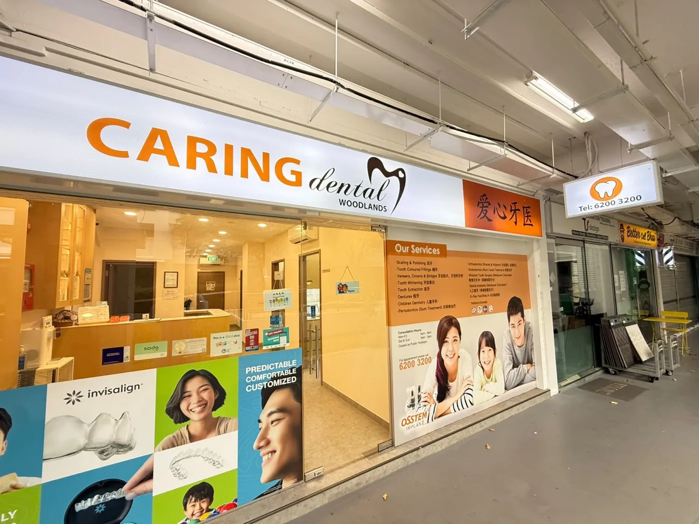 Storefront of Caring Dental Woodlands at 136 Marsiling Road