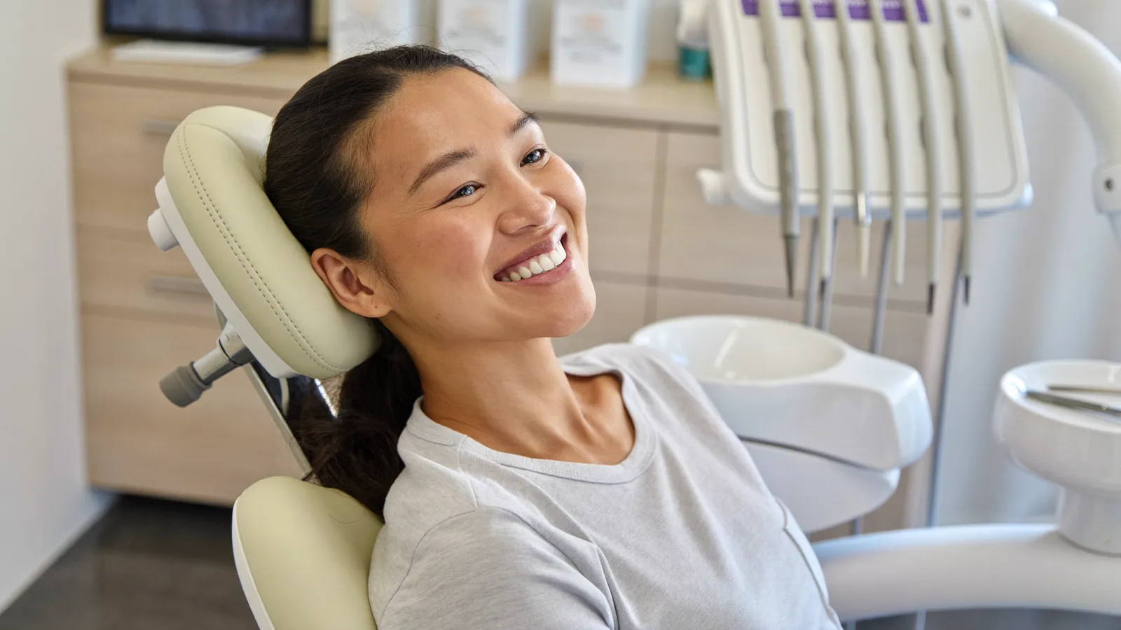 Relaxed patient in the dental chair before wisdom tooth surgery